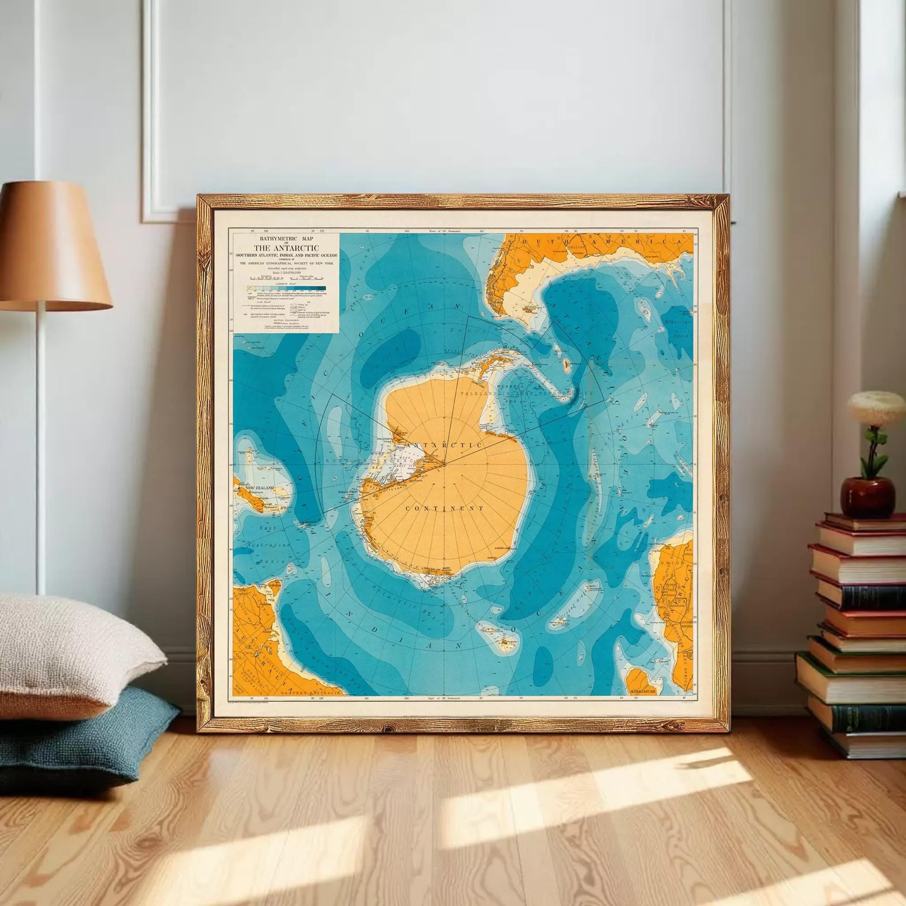 The image is a framed map of the Antarctic and surrounding regions, depicting the vast and intricate landscape of the icy continent.