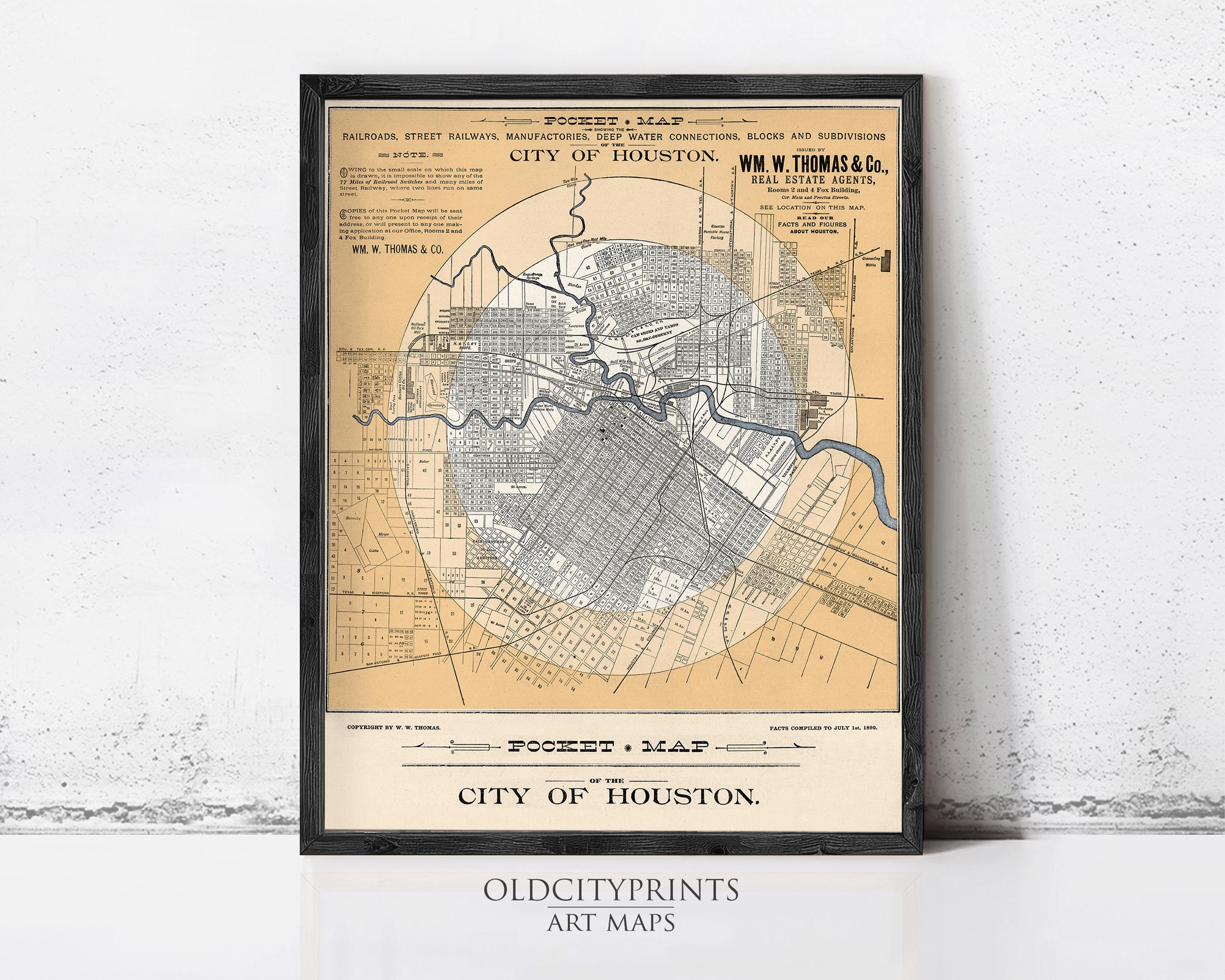 The image is a framed vintage map of the city of Houston, Texas, depicting the layout of the city and surrounding areas.