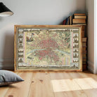 The image is a framed vintage map of Paris, France, depicting the city's streets and landmarks.