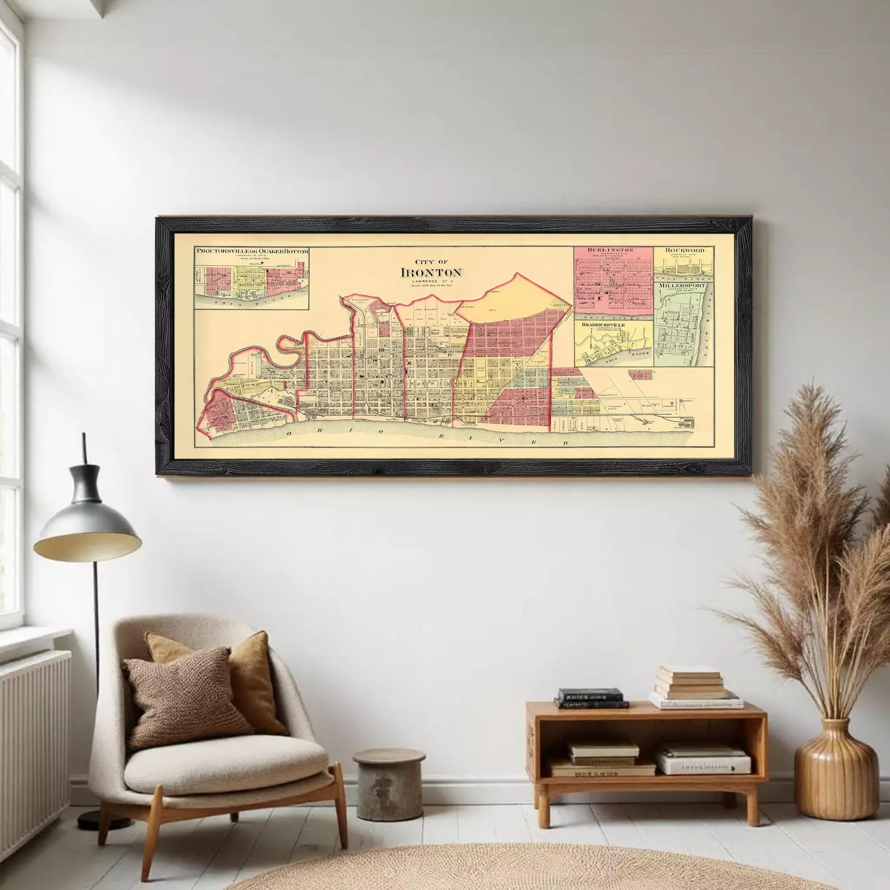 A framed map of the city of Houston, Texas, depicting the city's layout and surrounding areas.