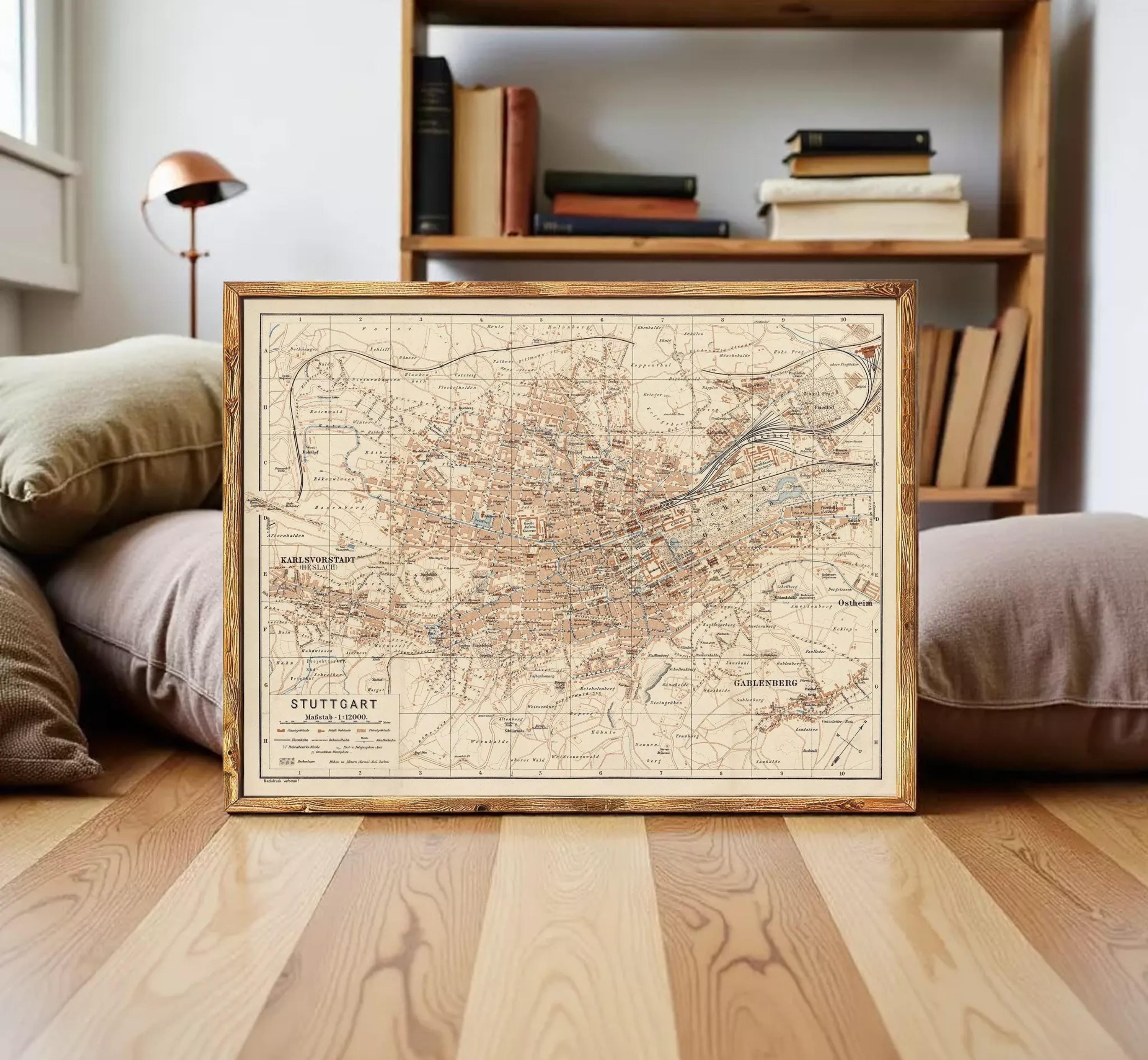 The image is a framed vintage map of Stuttgart, Germany, depicting the city's layout and surrounding areas.