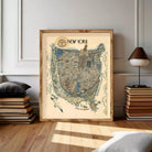 The image is a framed map of New York, depicting various landmarks and locations within the city.