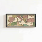 The image is a framed vintage map of Europe and the surrounding areas, displayed on a white wall.