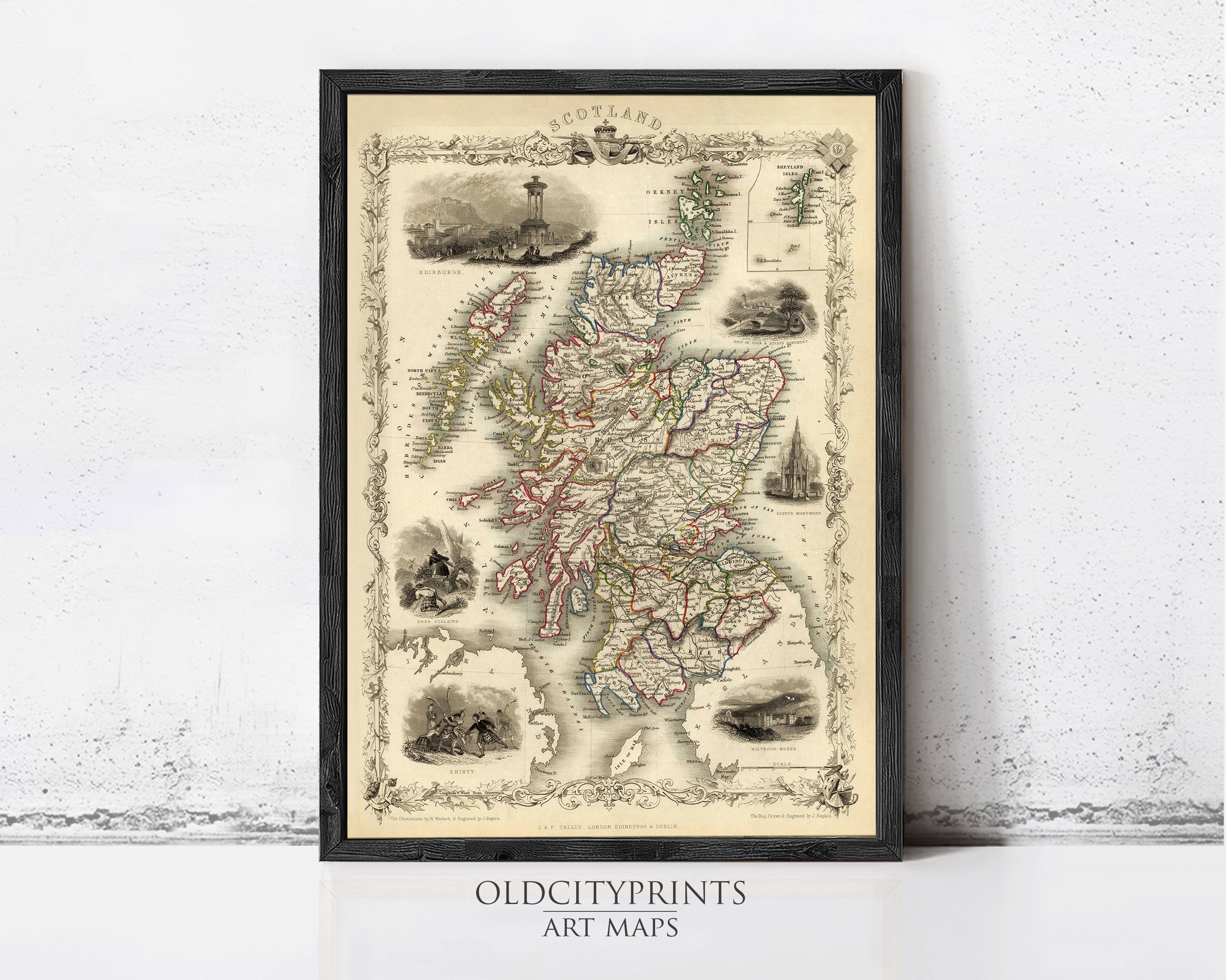 The image is a framed vintage map of Scotland, featuring detailed illustrations and labels.