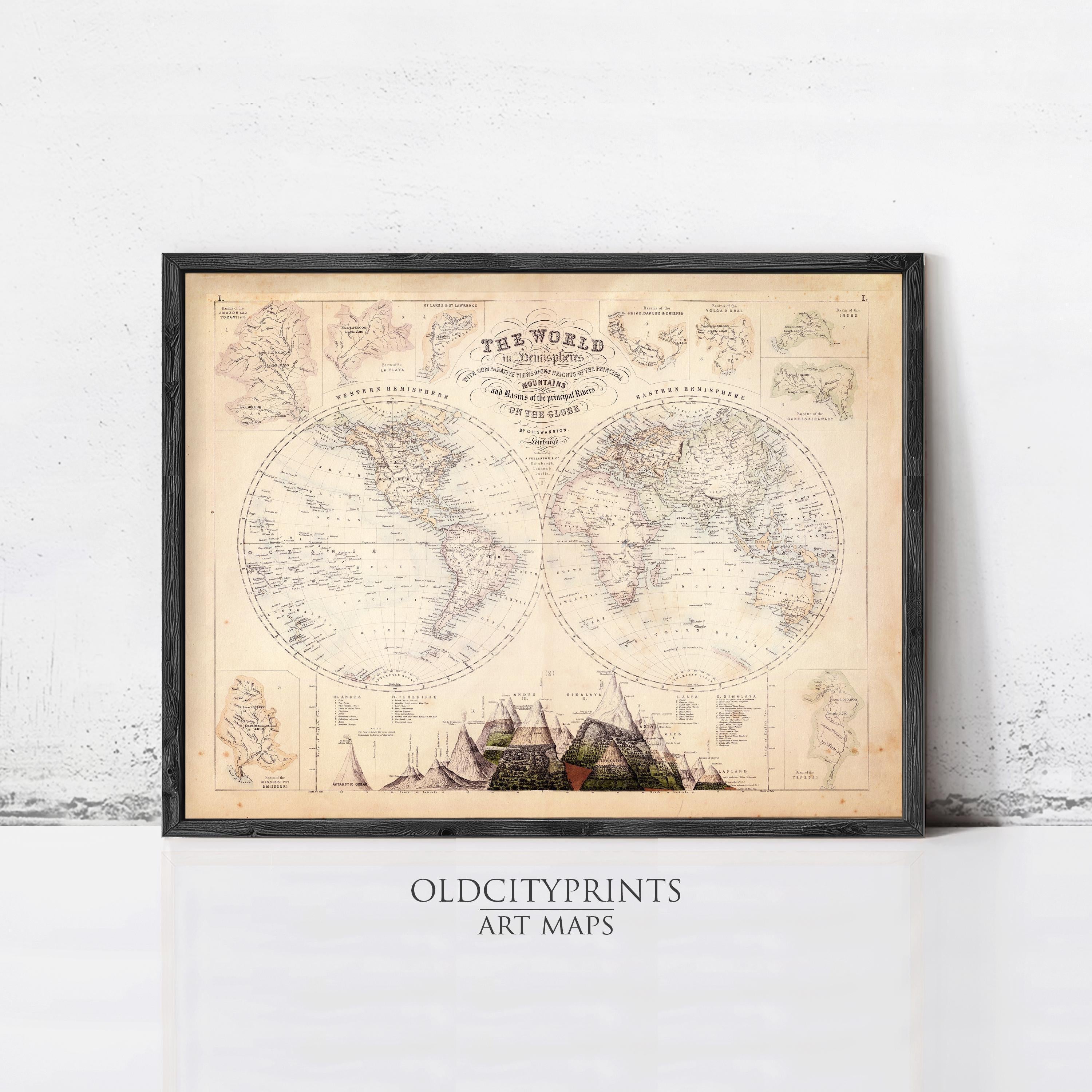 The image is a framed vintage world map with detailed illustrations and labels, displayed on a white wall.