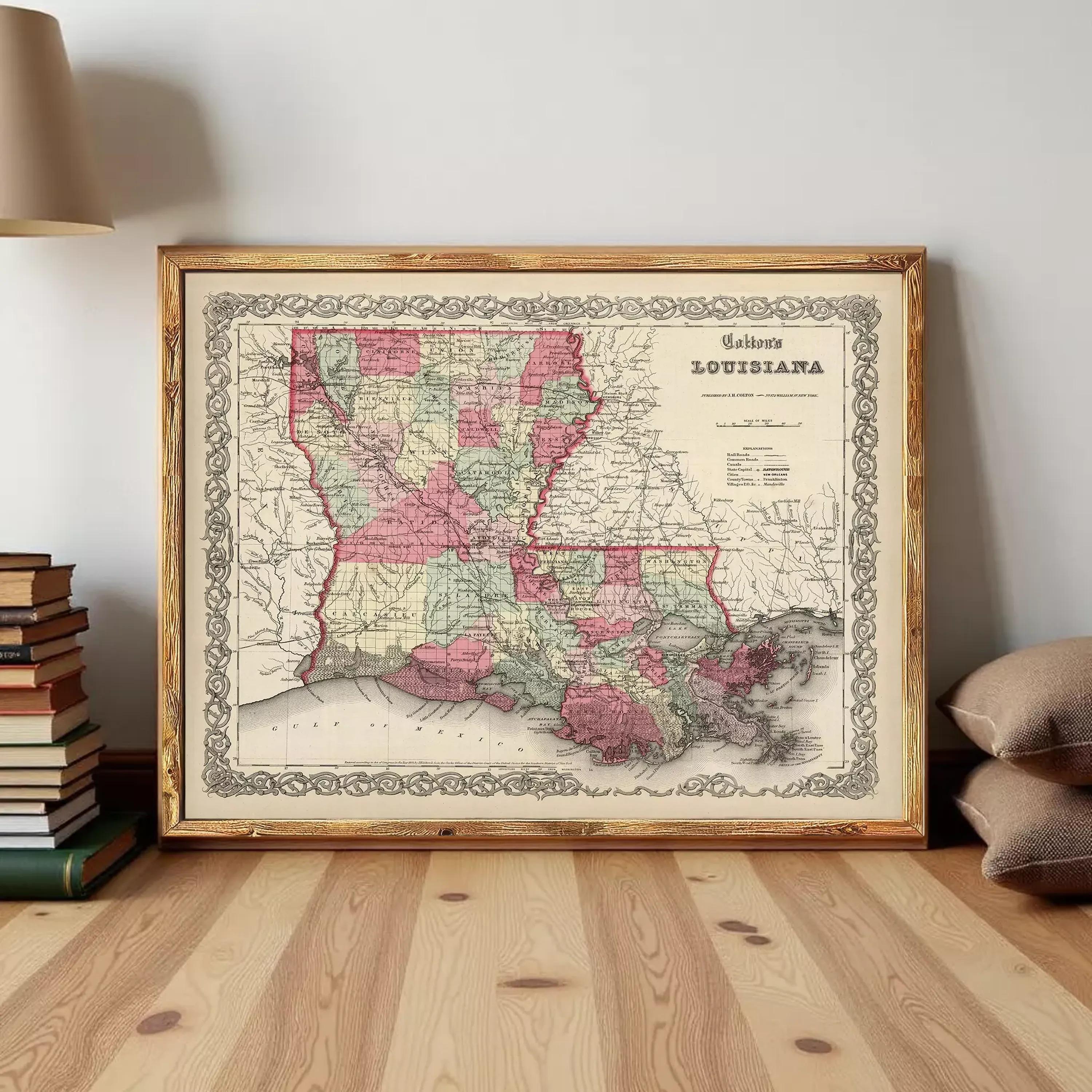 The image is a framed vintage map of Louisiana, depicting the state in a detailed and colorful manner.