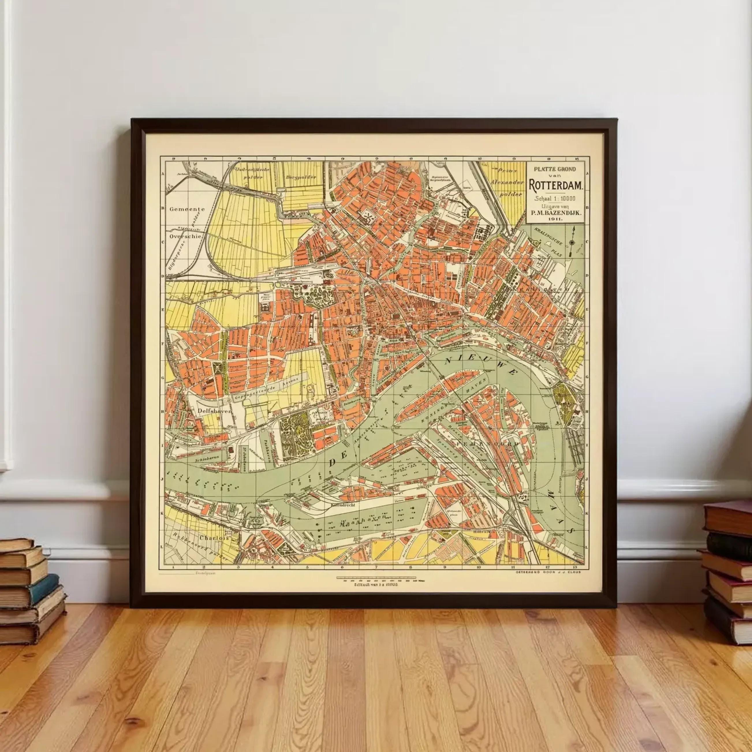 The image is a framed vintage map of Rotterdam, Netherlands, depicting the city's layout and surrounding areas.