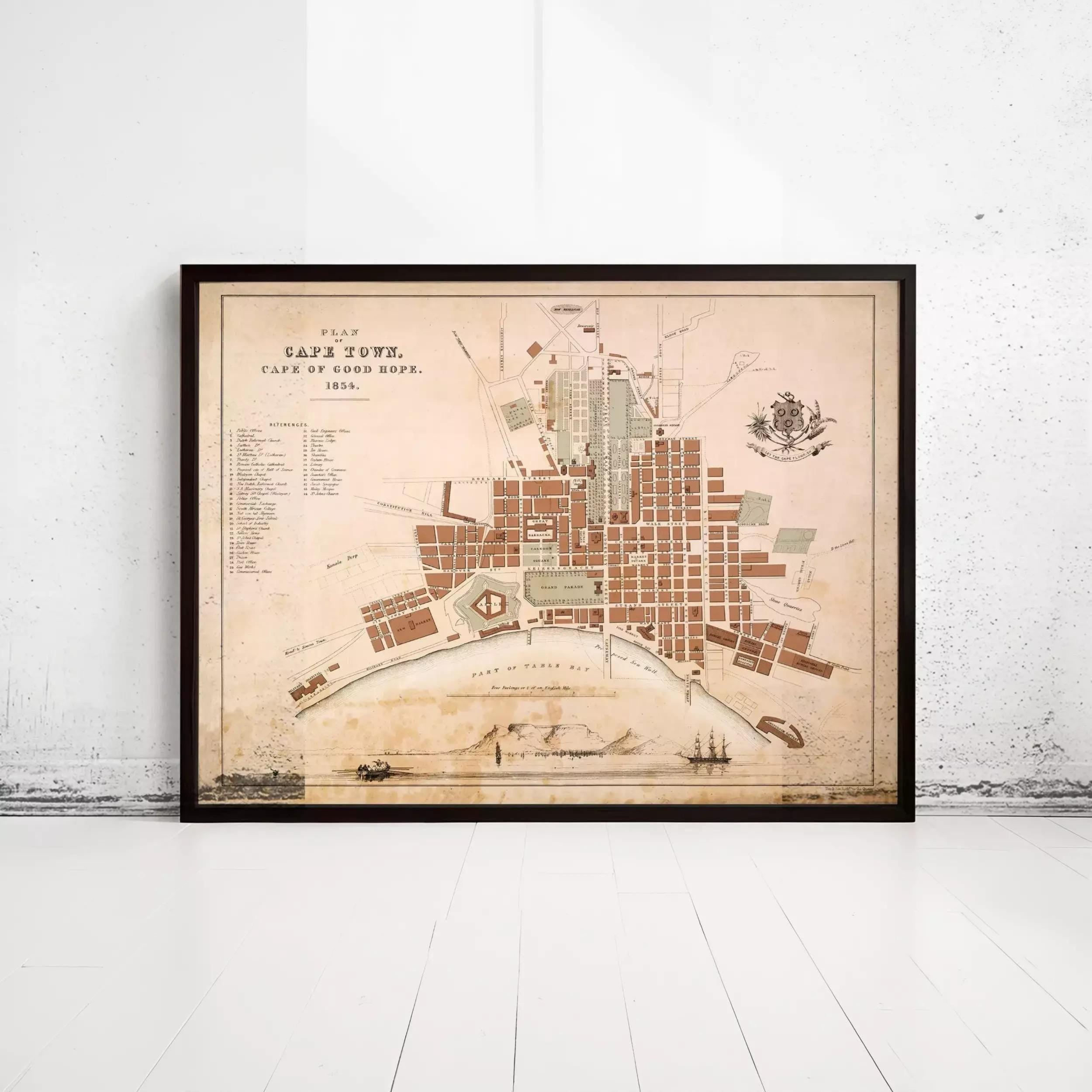 The image is a framed map of Cape Town, South Africa, depicting the city's layout and surrounding areas.