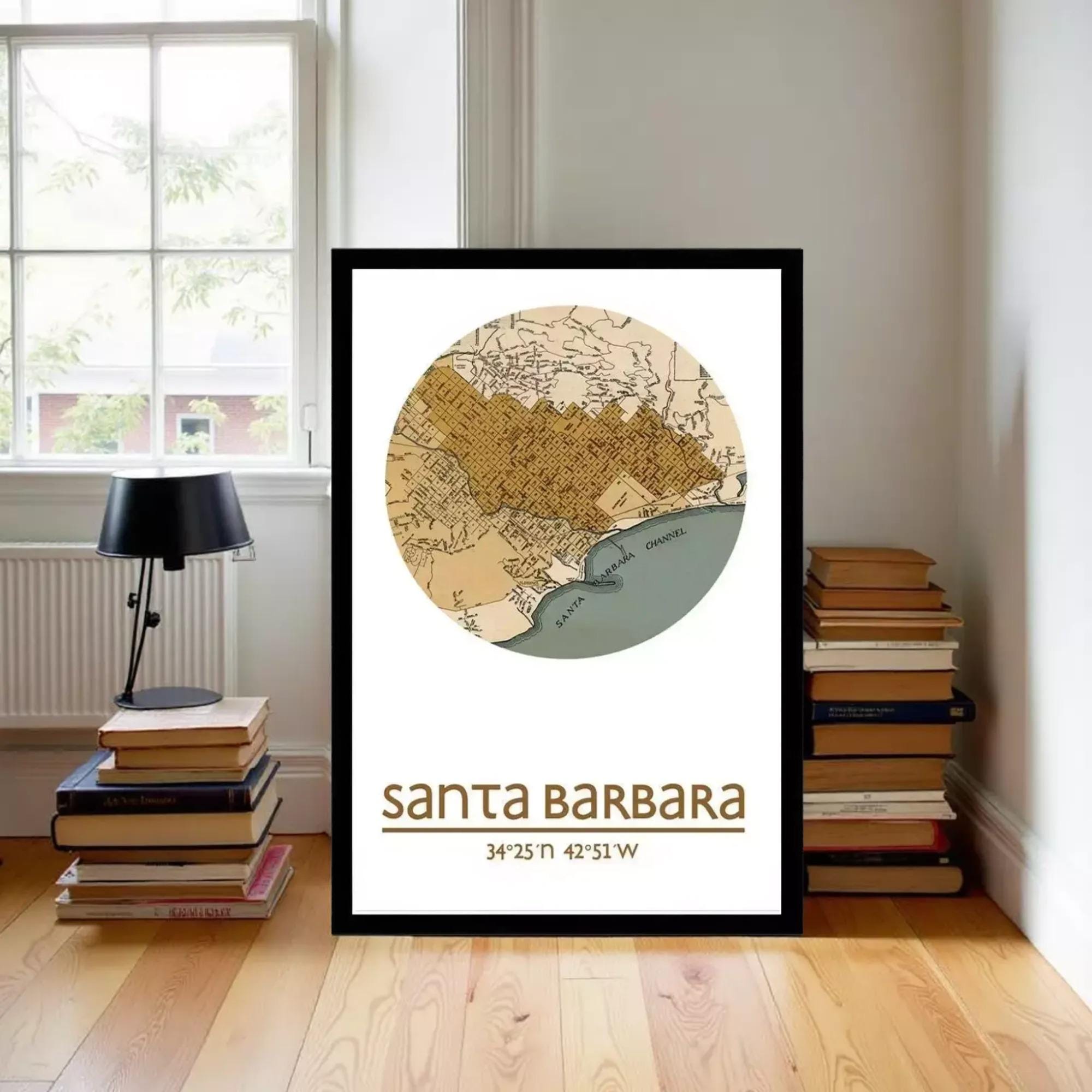 A framed map of Santa Barbara, California, with the text "Santa Barbara 34°25' 42°51" and a small illustration of the city.