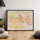 The image is a framed vintage map of Paris, France, depicting the city's streets and landmarks.