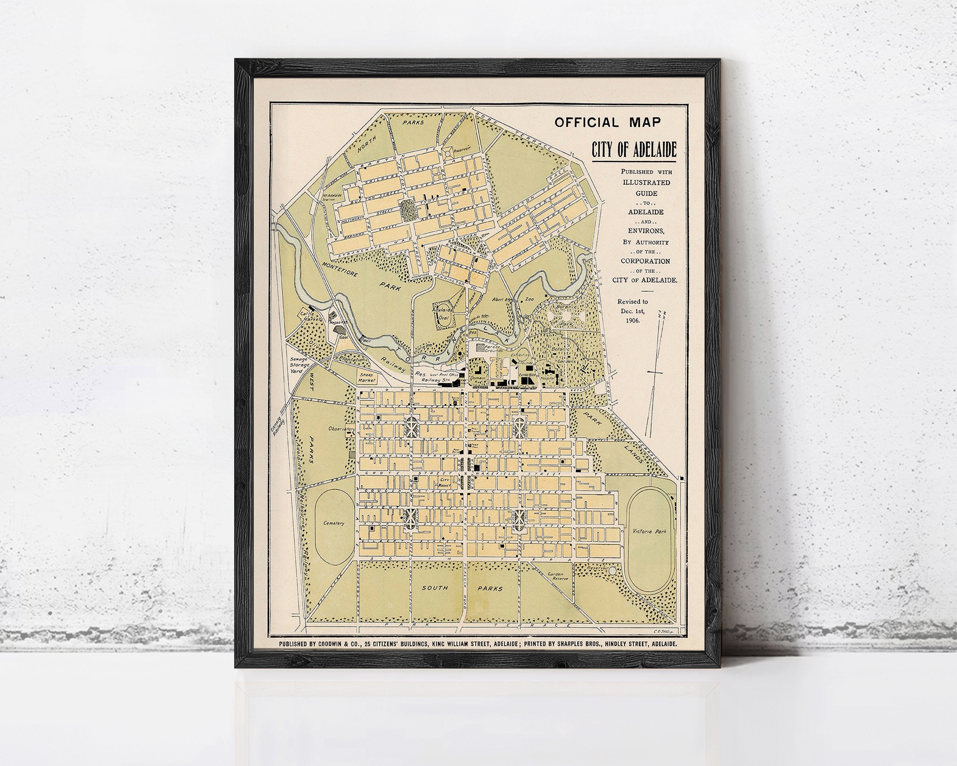 The image is an old map of the City of Adelaide, Australia, depicting the city's layout and surrounding areas.