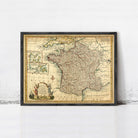 The image is a framed vintage map of France, depicting the country's geographical layout and surrounding regions.