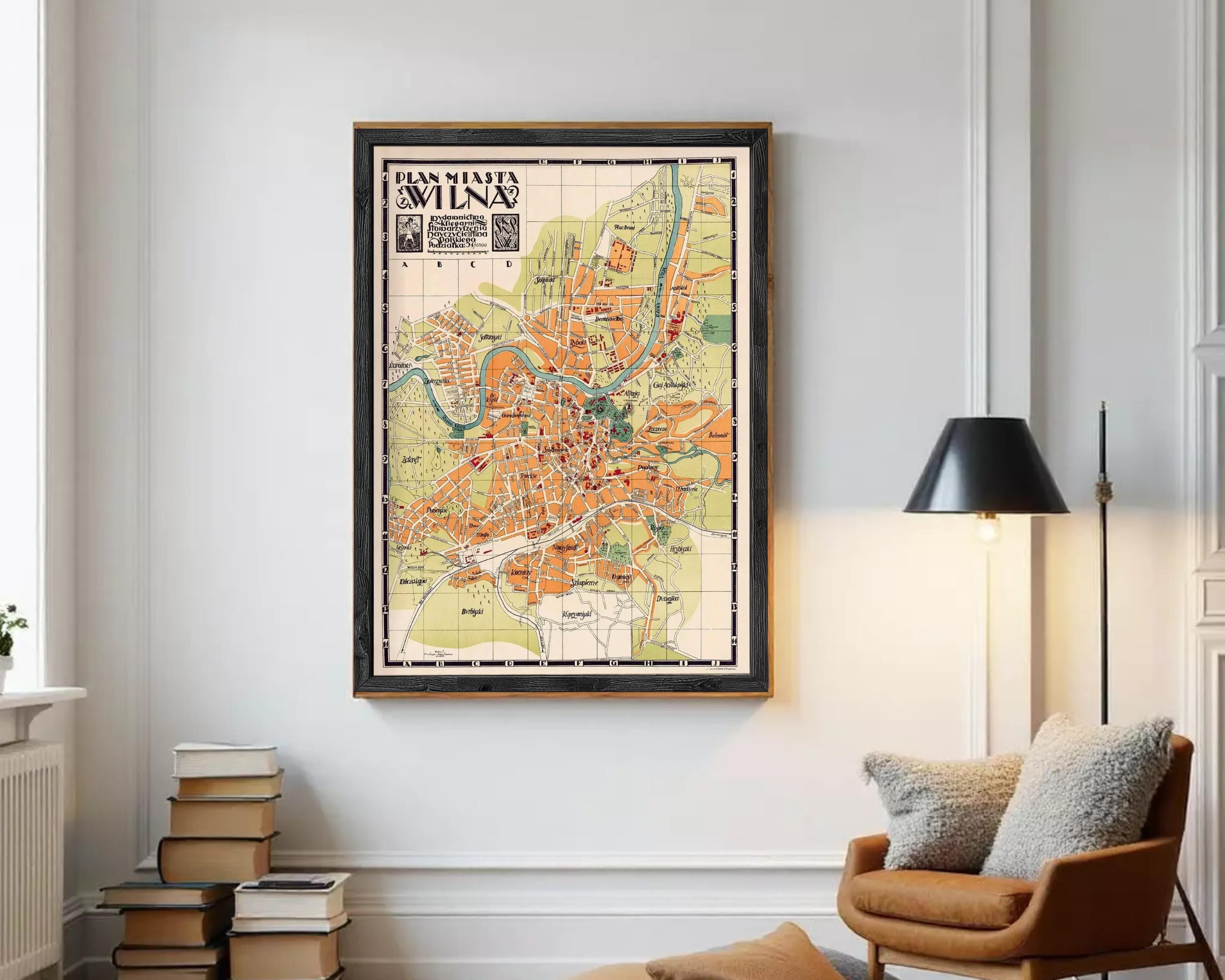 The image is a framed vintage map of Milan, Italy, depicting the city's layout and surrounding areas.