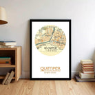 A framed vintage map of Quimper, France, with the city's name and location prominently displayed.
