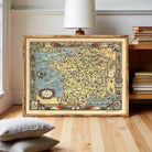 The image is a framed vintage map of France, featuring intricate illustrations and detailed geographical information.