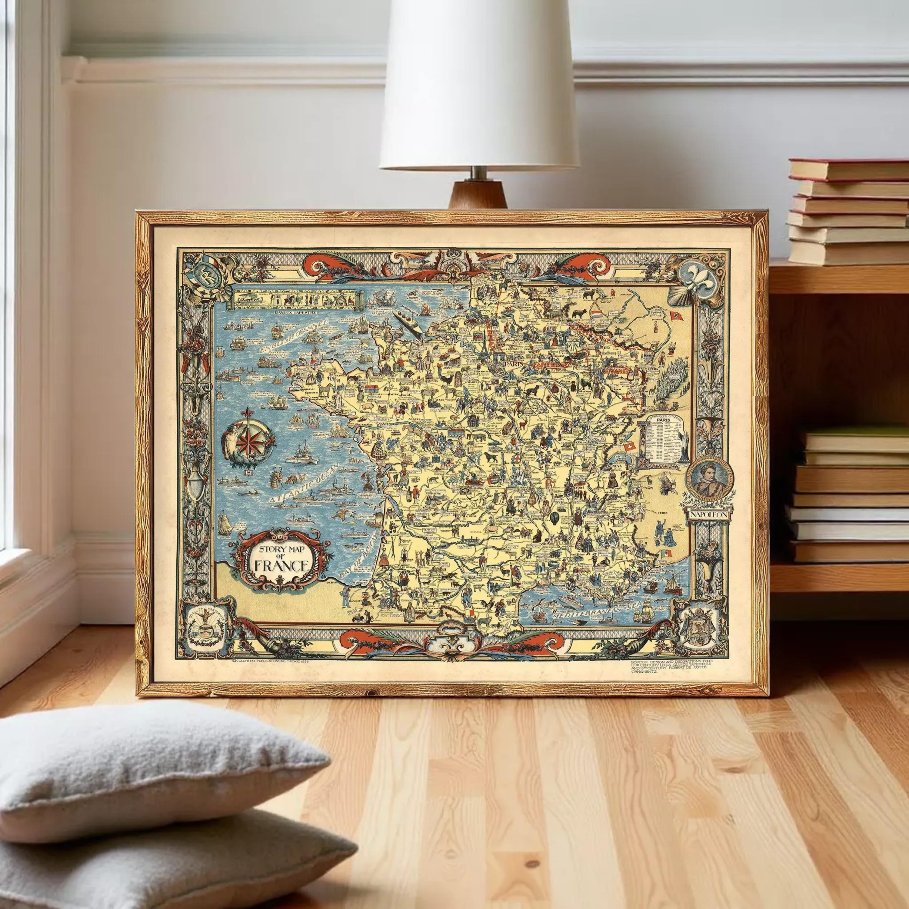 The image is a framed vintage map of France, featuring intricate illustrations and detailed geographical information.
