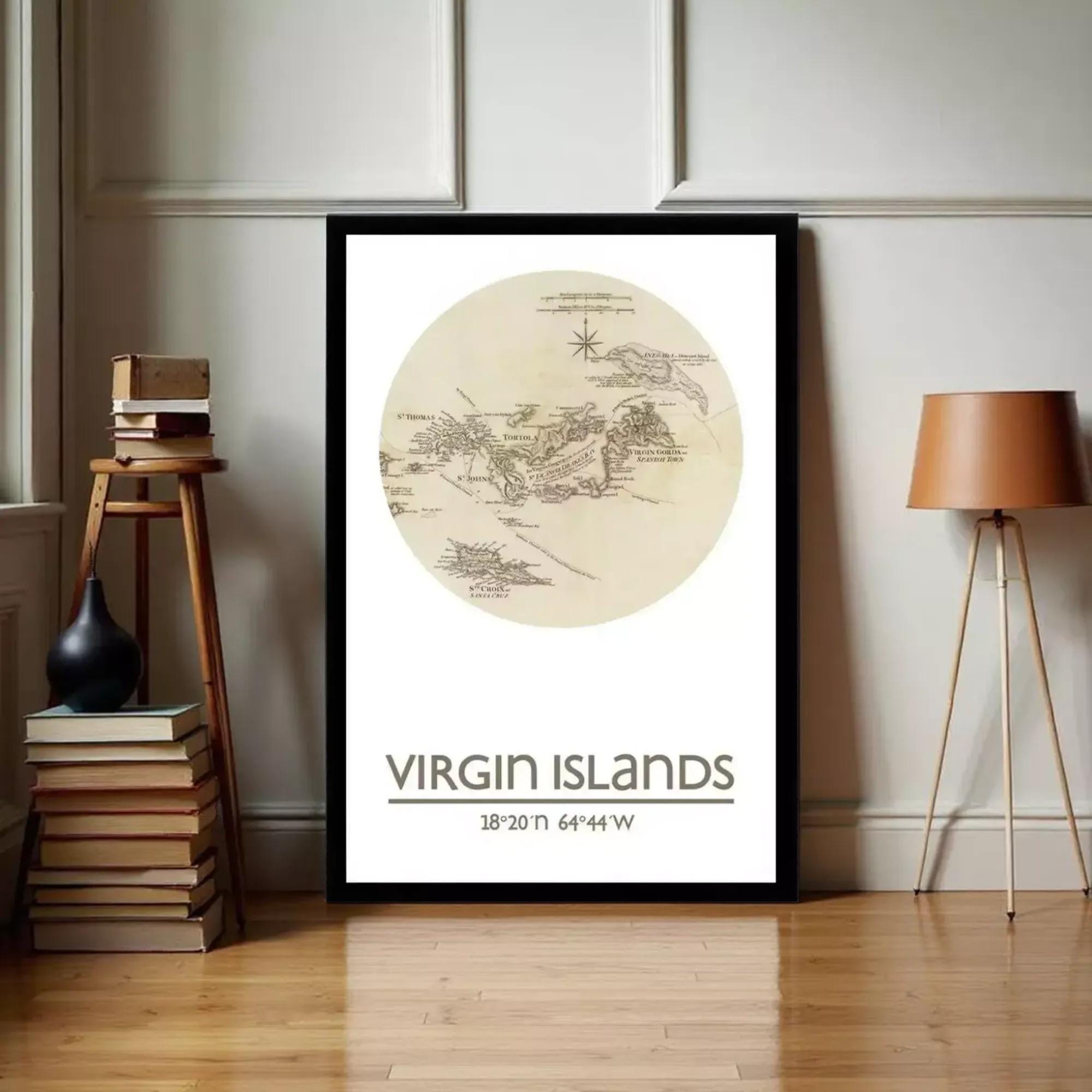 a framed map of the Virgin Islands, with a wooden stool and a lamp to the side.