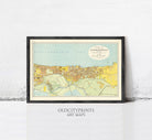 The image is a framed vintage map of the city of Alexandria, depicting the city's layout and surrounding areas.