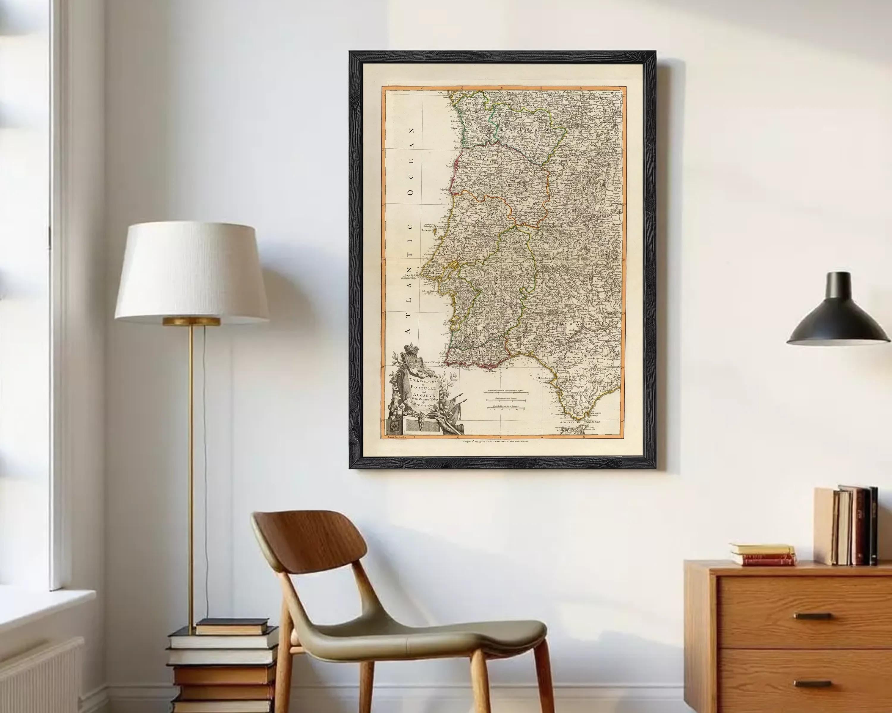 The image is a framed antique map of Portugal, featuring detailed geographical information and a color scheme of various shades of brown and green.
