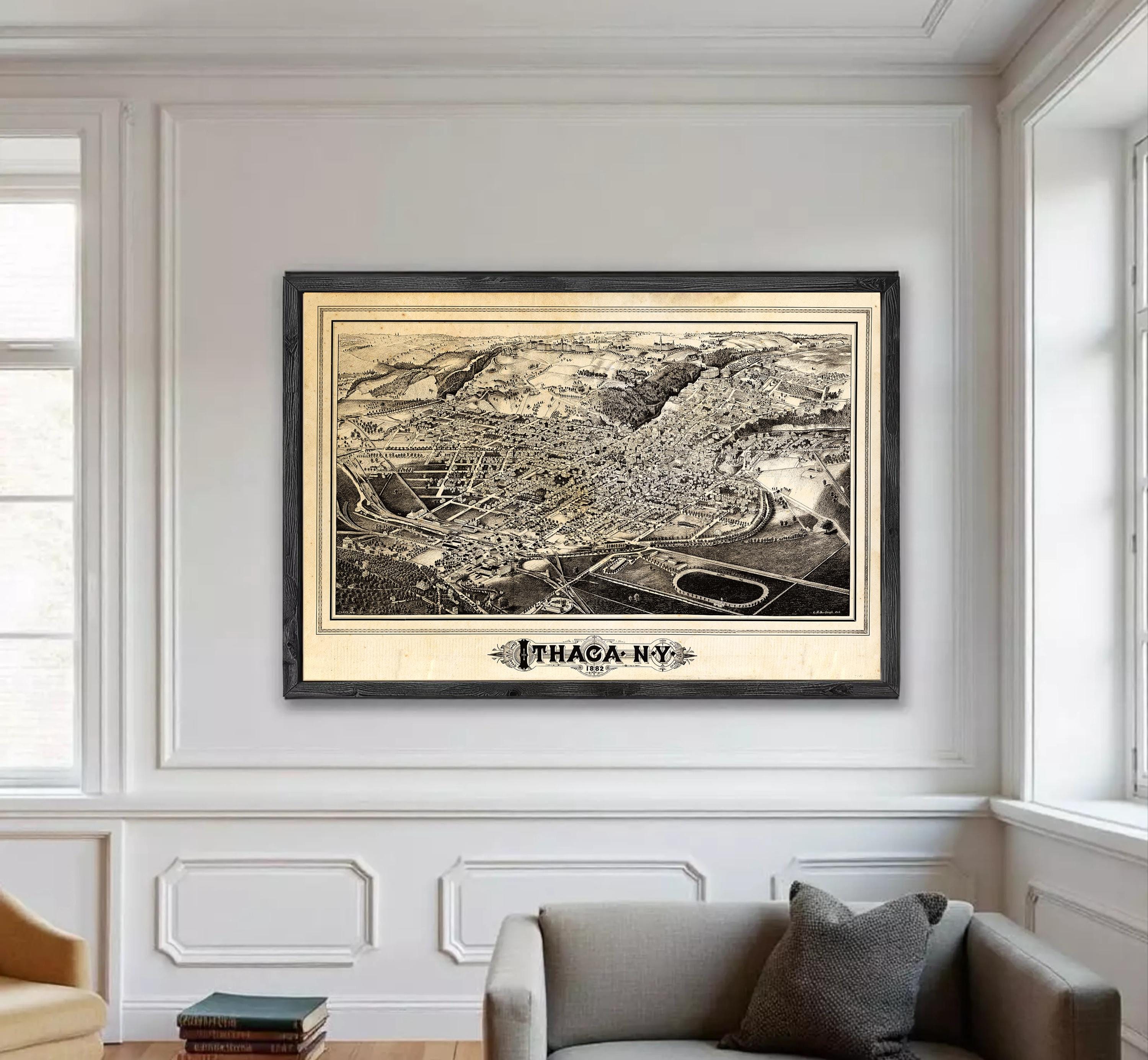 a large framed map of Thaca, New York, hanging on a wall in a living room.