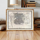 The image is a framed historical map of Madrid, Spain, depicting the city's layout and surrounding areas.