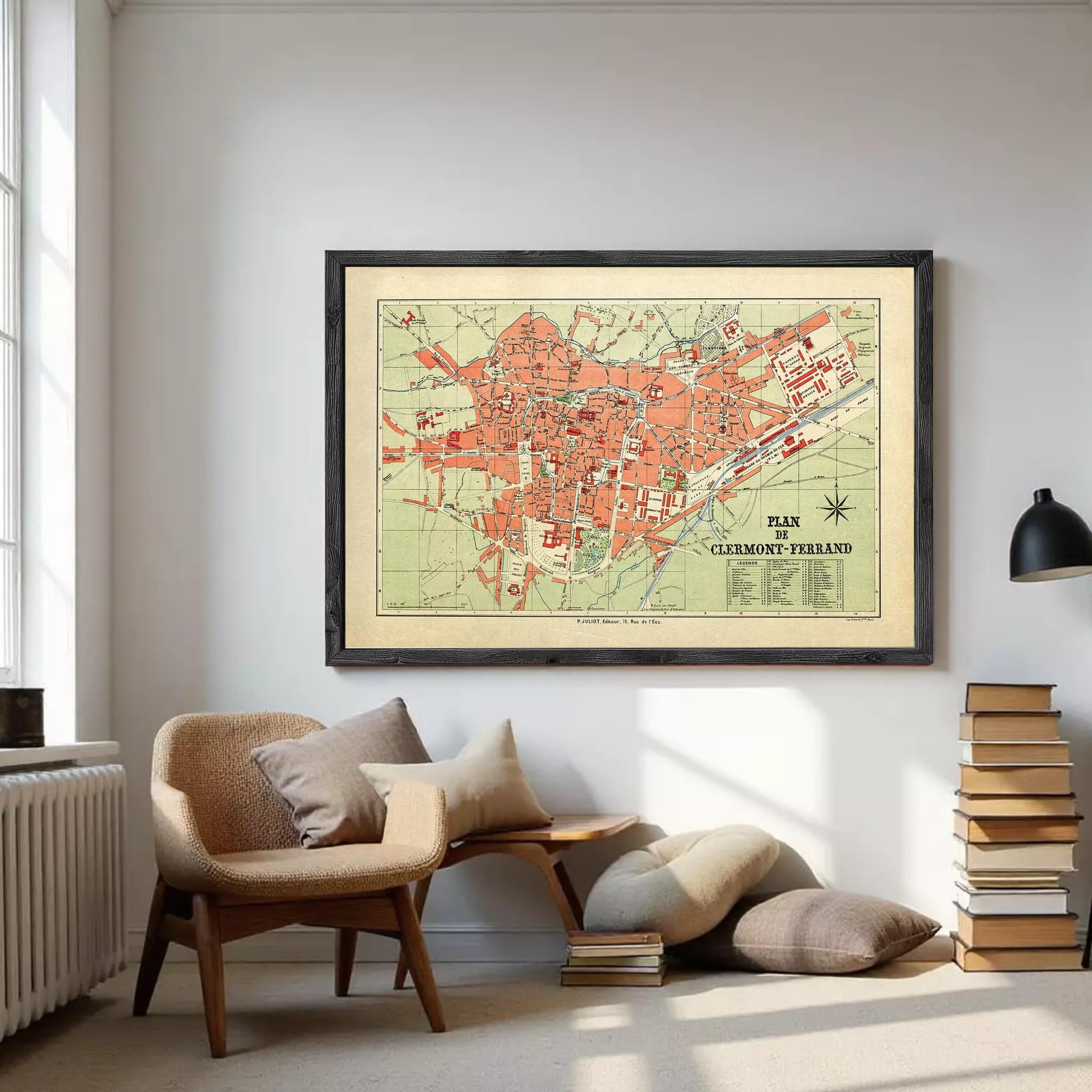 The image is a framed vintage map of Clermont-Ferrand, France, depicting the city's layout and surrounding areas.