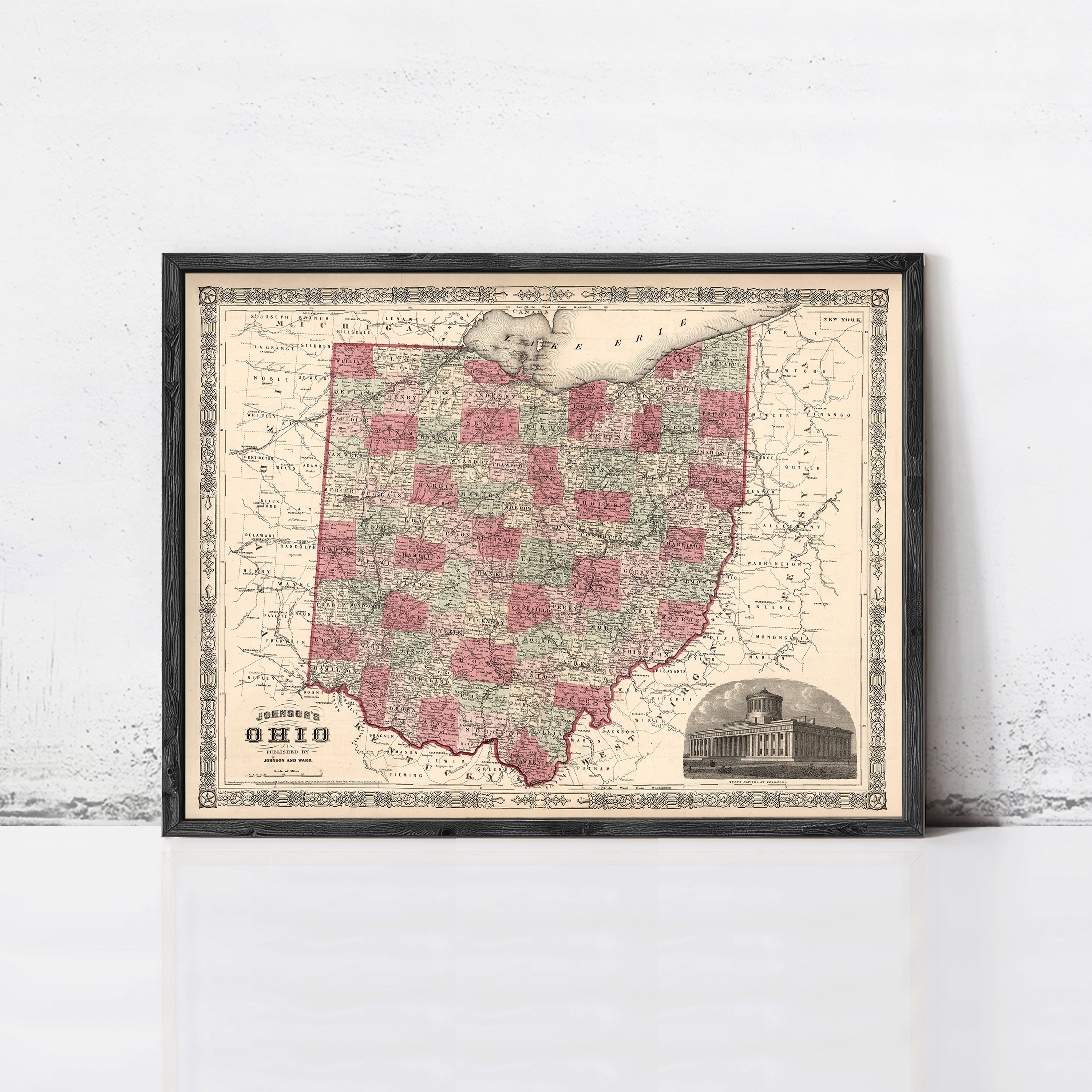 The image is a framed vintage map of Ohio, featuring a detailed and colorful depiction of the state's geography and surrounding areas.