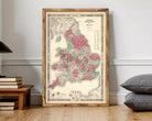 The image is a framed vintage map of the United Kingdom, specifically England and Wales, with a wooden frame.