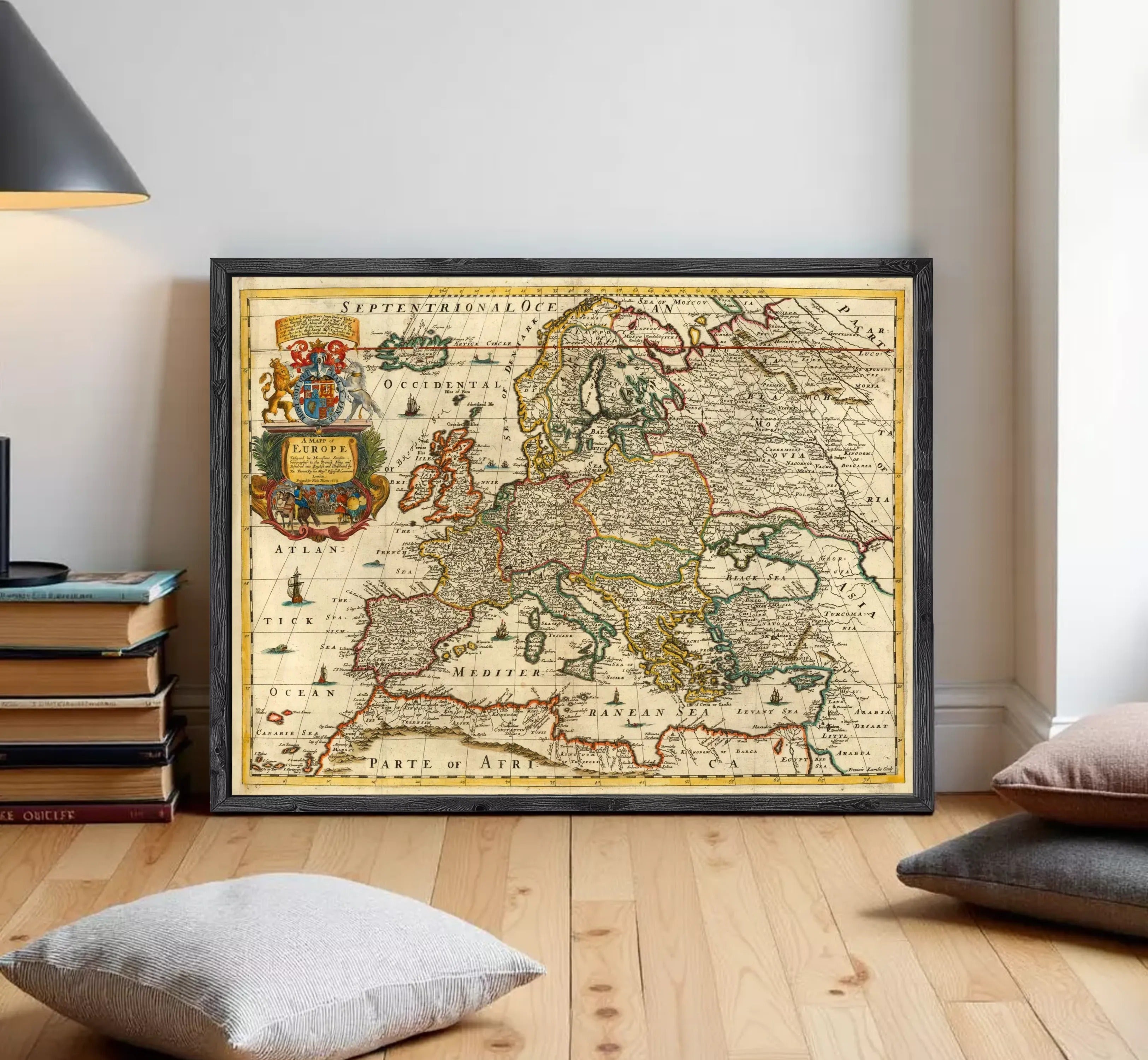 The image is a framed vintage map of Europe, depicting the continent and surrounding seas.