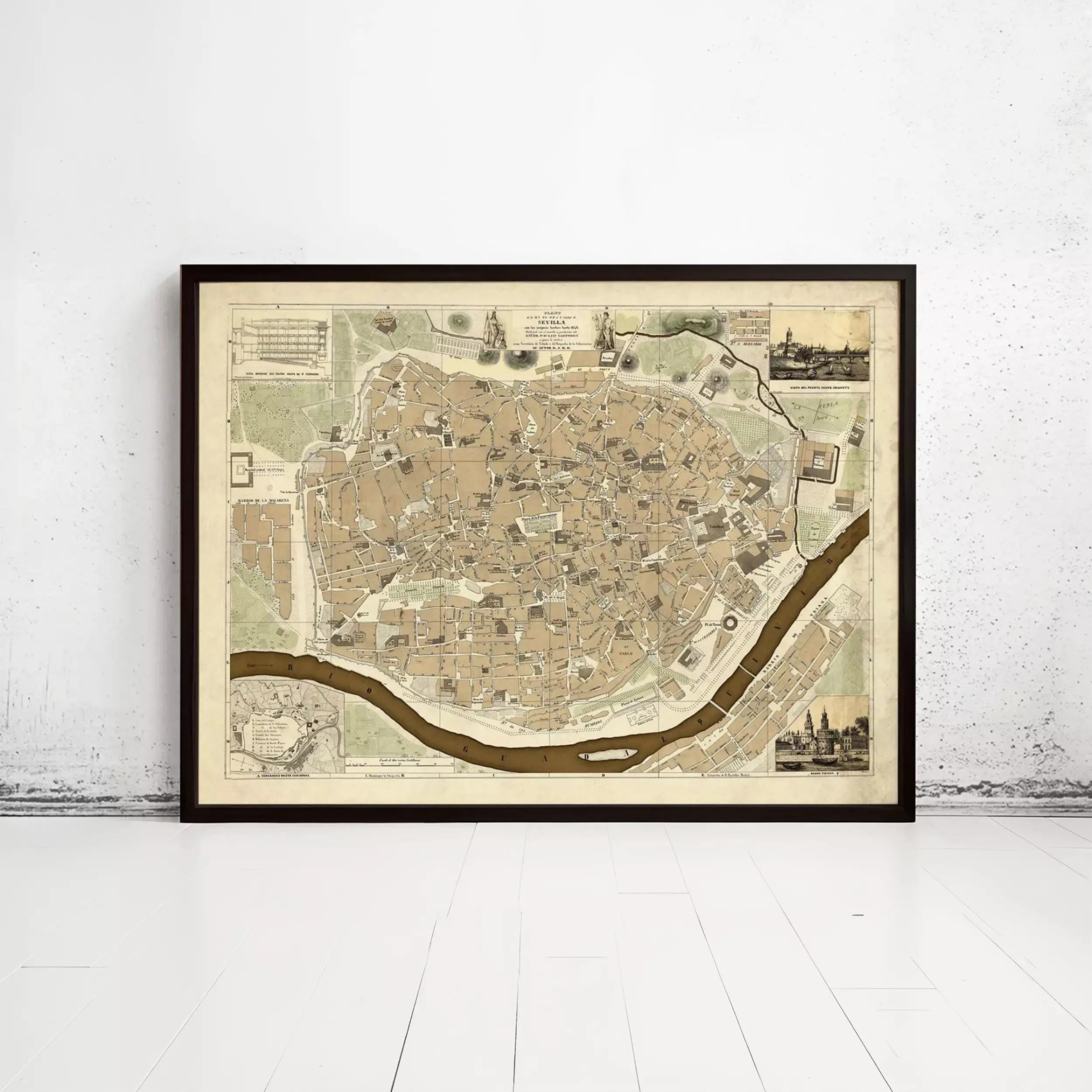 The image is a framed map of a city, likely a historical or geographical map, displayed on a white wall.