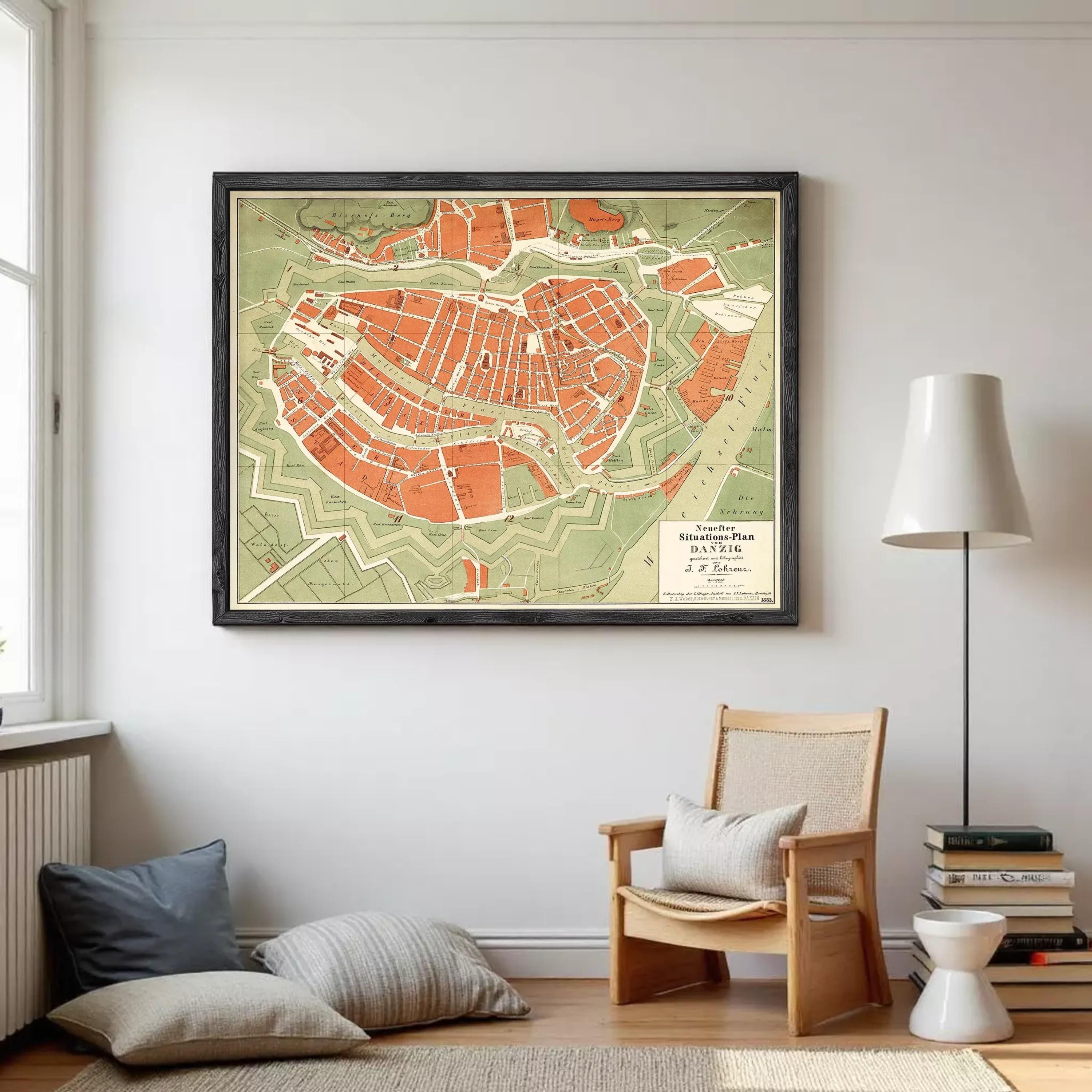 The image is a framed map of a city, likely from the 19th century, with a vintage style and a color palette of green, orange, and red.