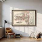 A framed map of New York State, depicting the state's geographical layout and surrounding areas.