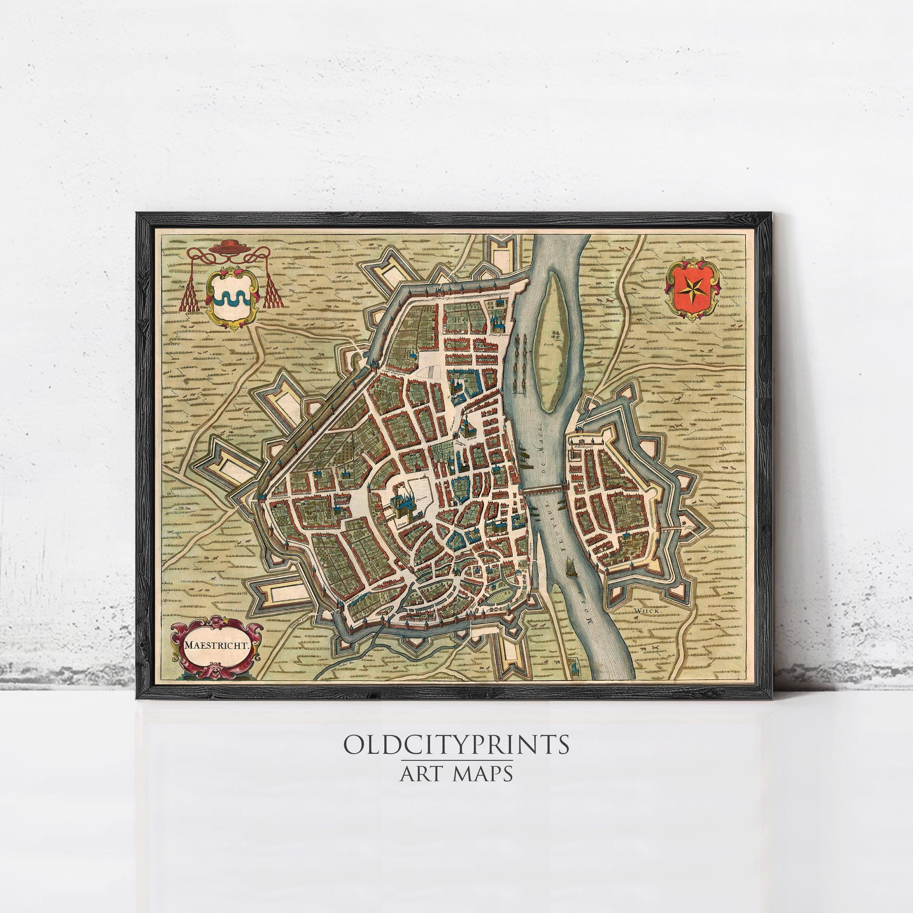 The image is a framed vintage map of a city, likely from the 16th century, with detailed illustrations and markings.