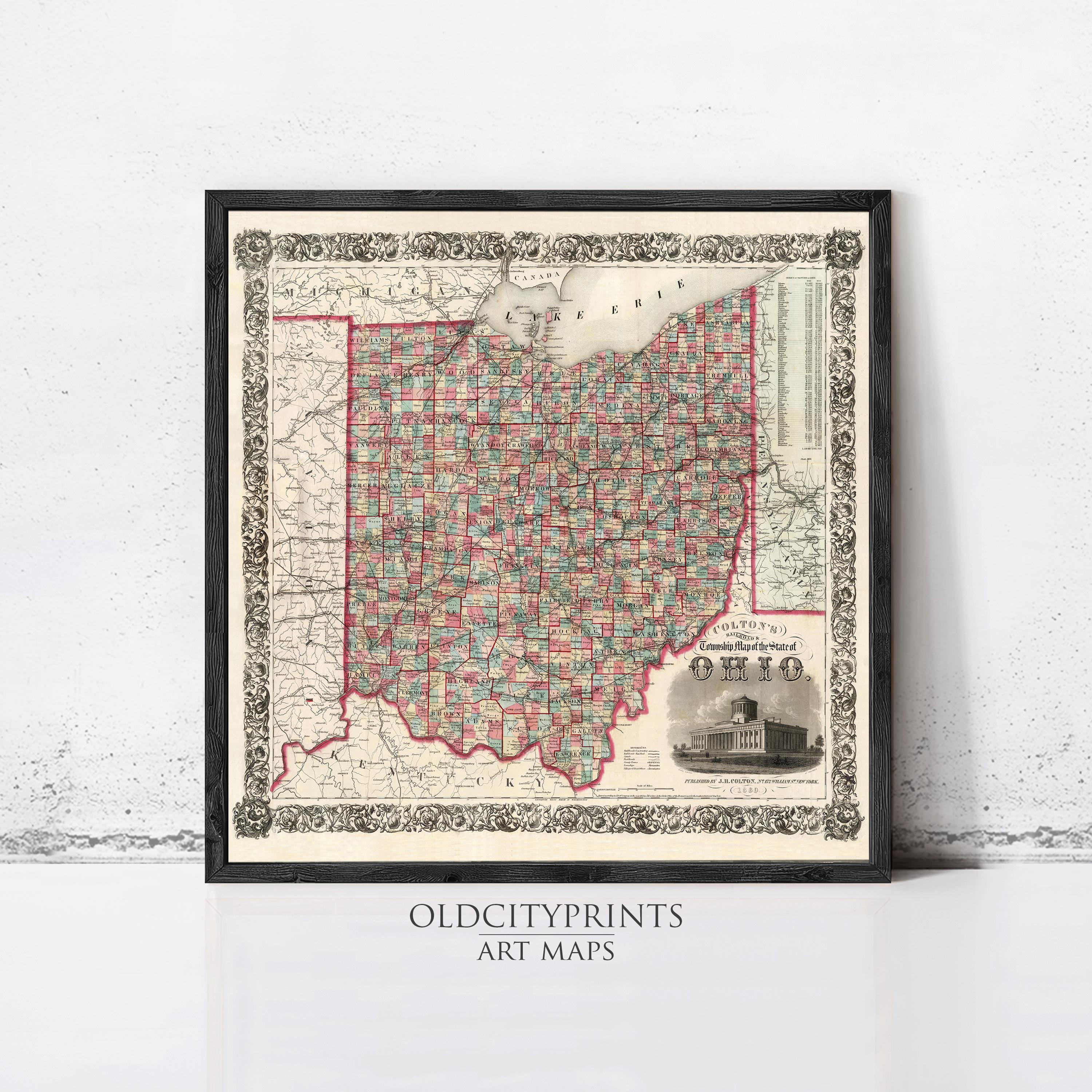 The image is a framed vintage map of Ohio, featuring detailed geographical information and a small illustration of a building.