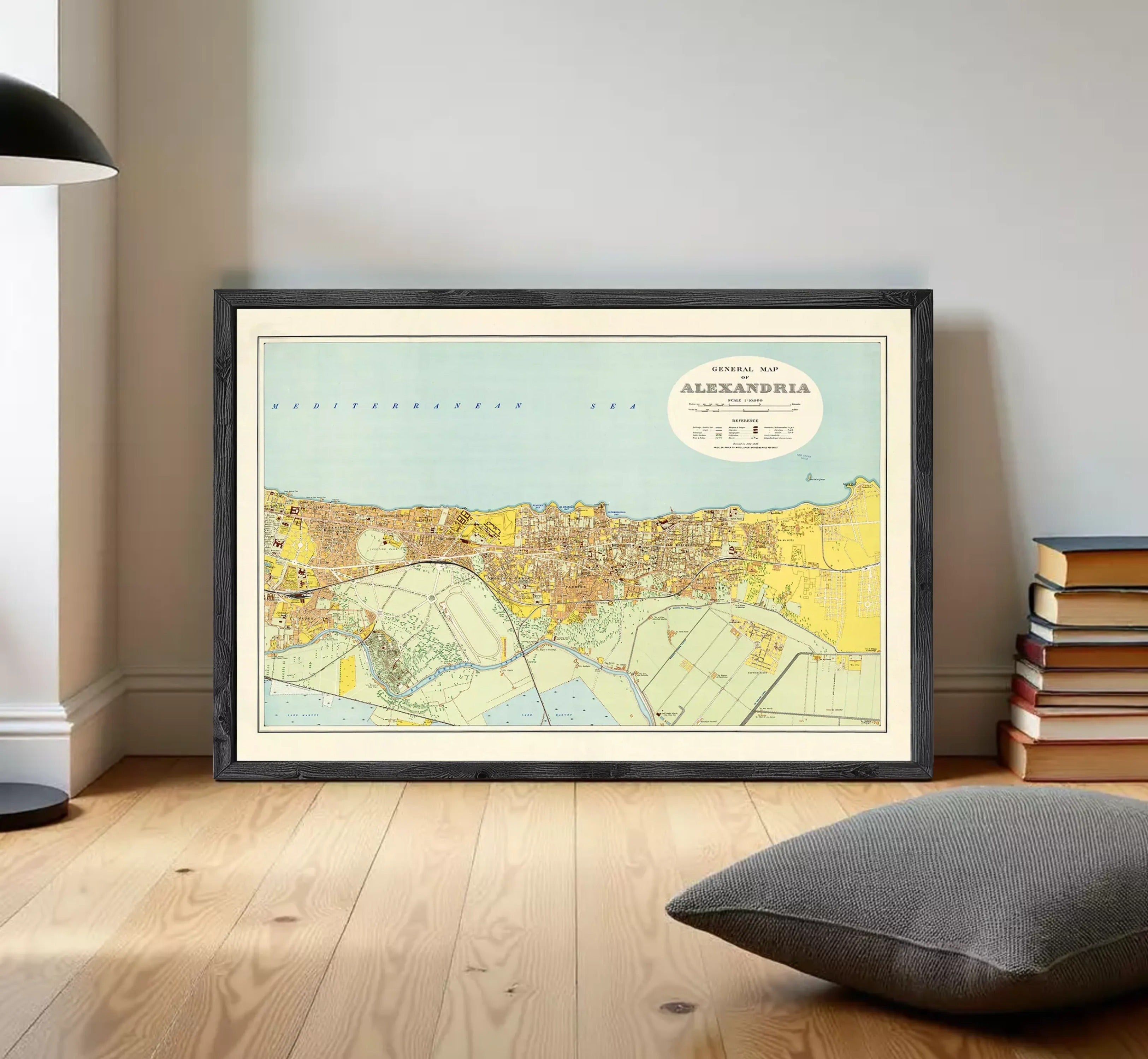 The image is a framed map of the city of Moscow, Russia, depicting the city's streets, landmarks, and surrounding areas.