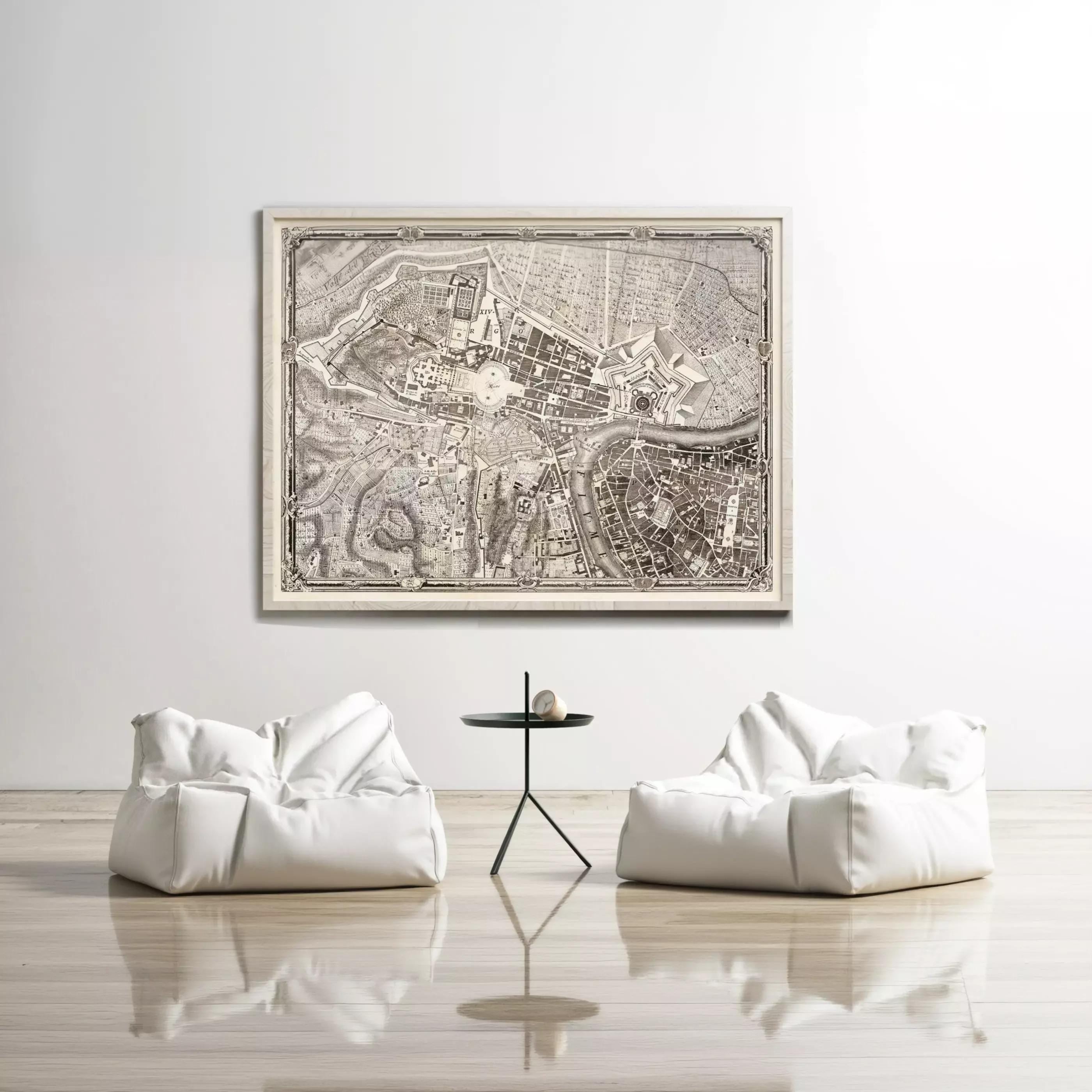 a large framed map of a city hanging on a white wall, with two white bean bag chairs positioned in front of it.