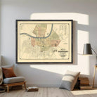 The image is a framed map of Nashville, Tennessee, depicting the city's streets and surrounding areas.