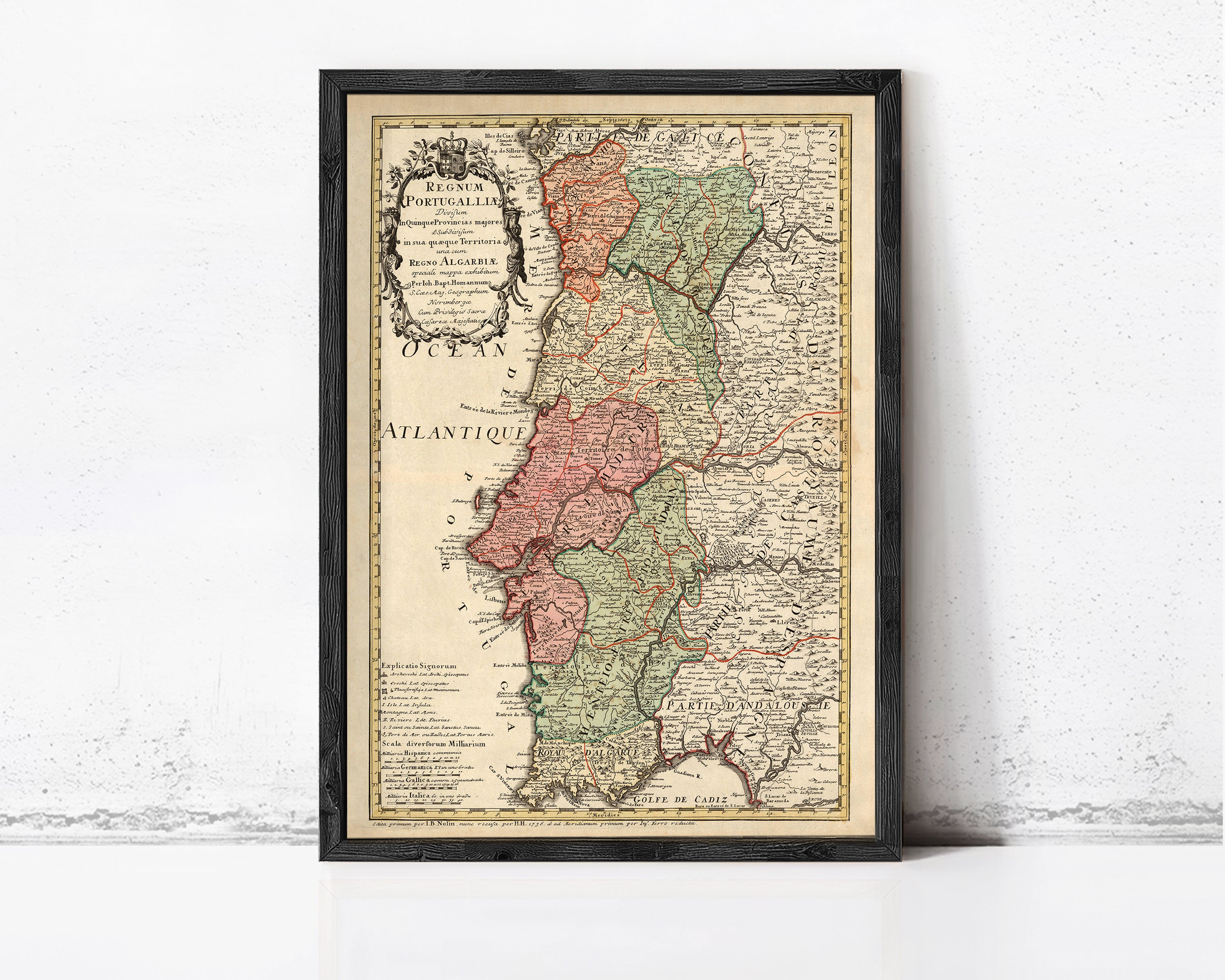 The image is a framed vintage map of Portugal, showing the different regions and their geographical features.
