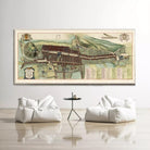 a large, detailed map of a city displayed on a wall, with two white bean bag chairs positioned in front of it.