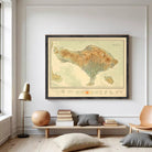 The image is a framed map of Bali, Indonesia, depicting the island's geographical features and boundaries.