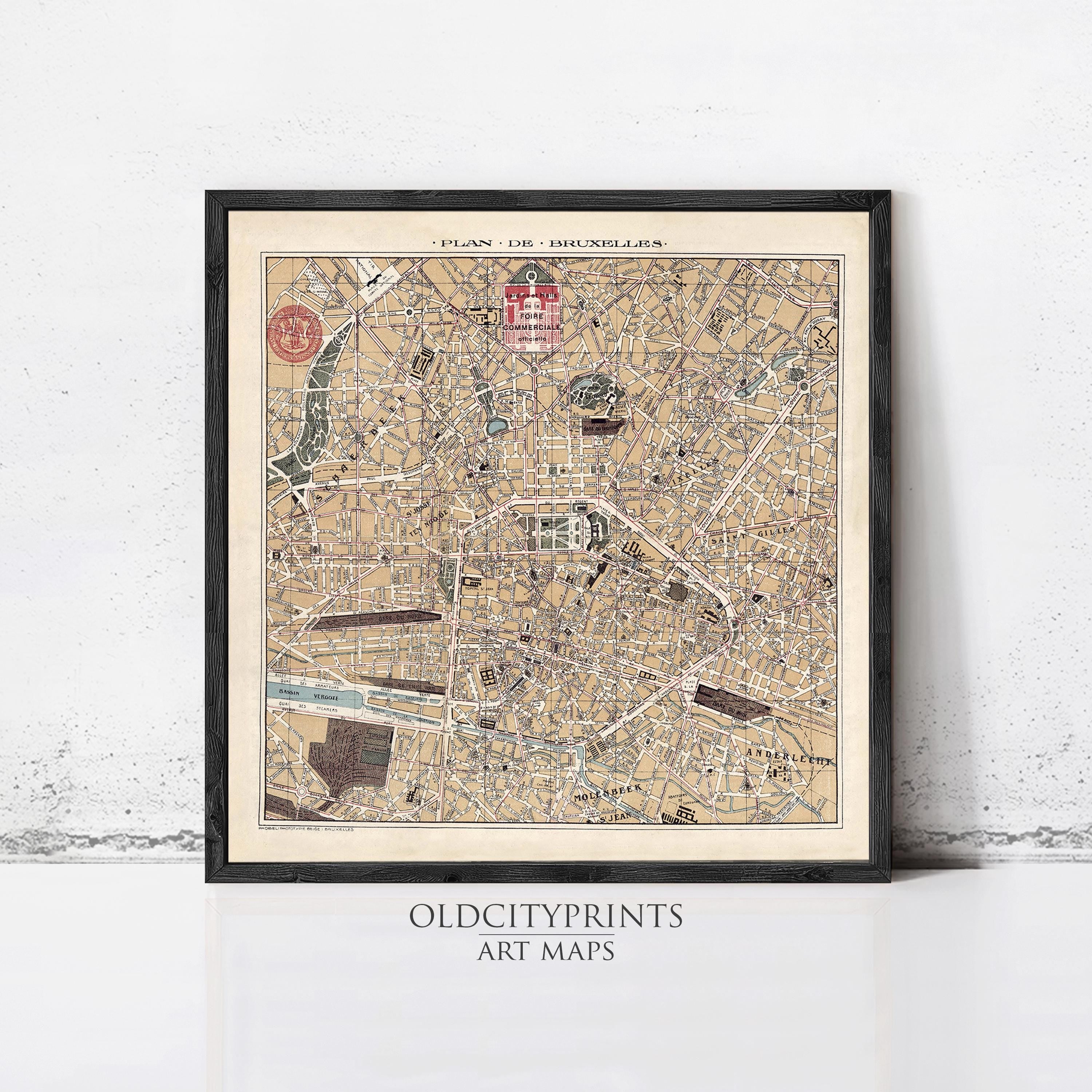 The image is a framed vintage map of Brussels, Belgium, depicting the city's streets and landmarks.