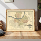 The image is a framed map of Nashville, Tennessee, showing the city's streets and surrounding areas.