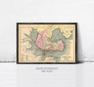 The image is a framed vintage map of Portland, Oregon, depicting the city's layout and surrounding areas.