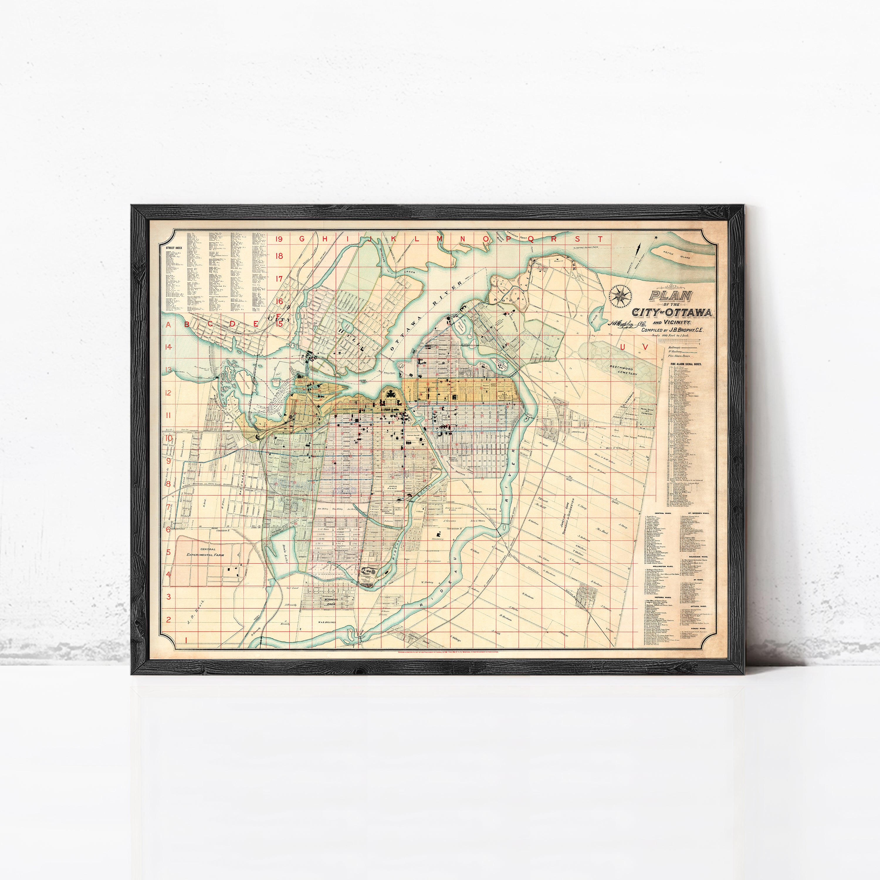 The image is a framed vintage map of a city, likely Ottawa, Canada, with detailed street and area labels.