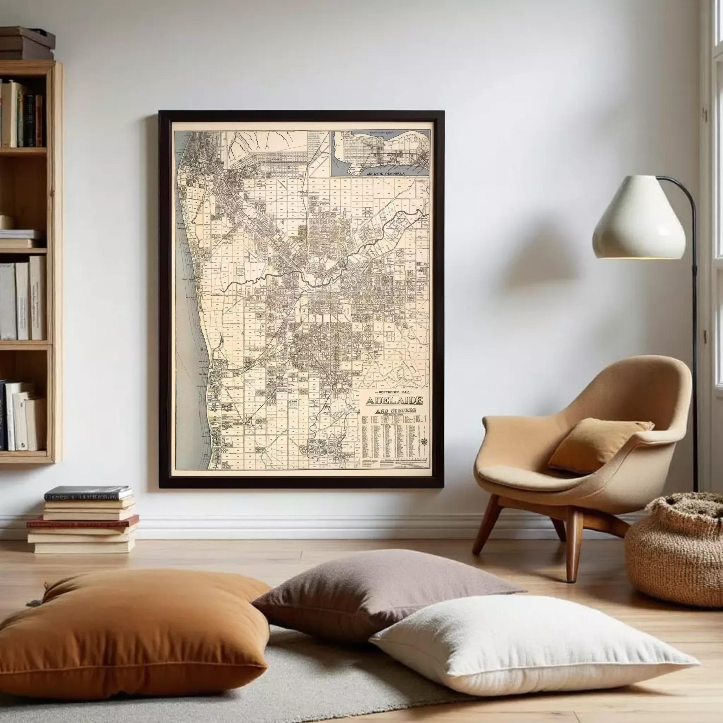 a large framed map of a city hanging on a wall in a cozy living room setting.