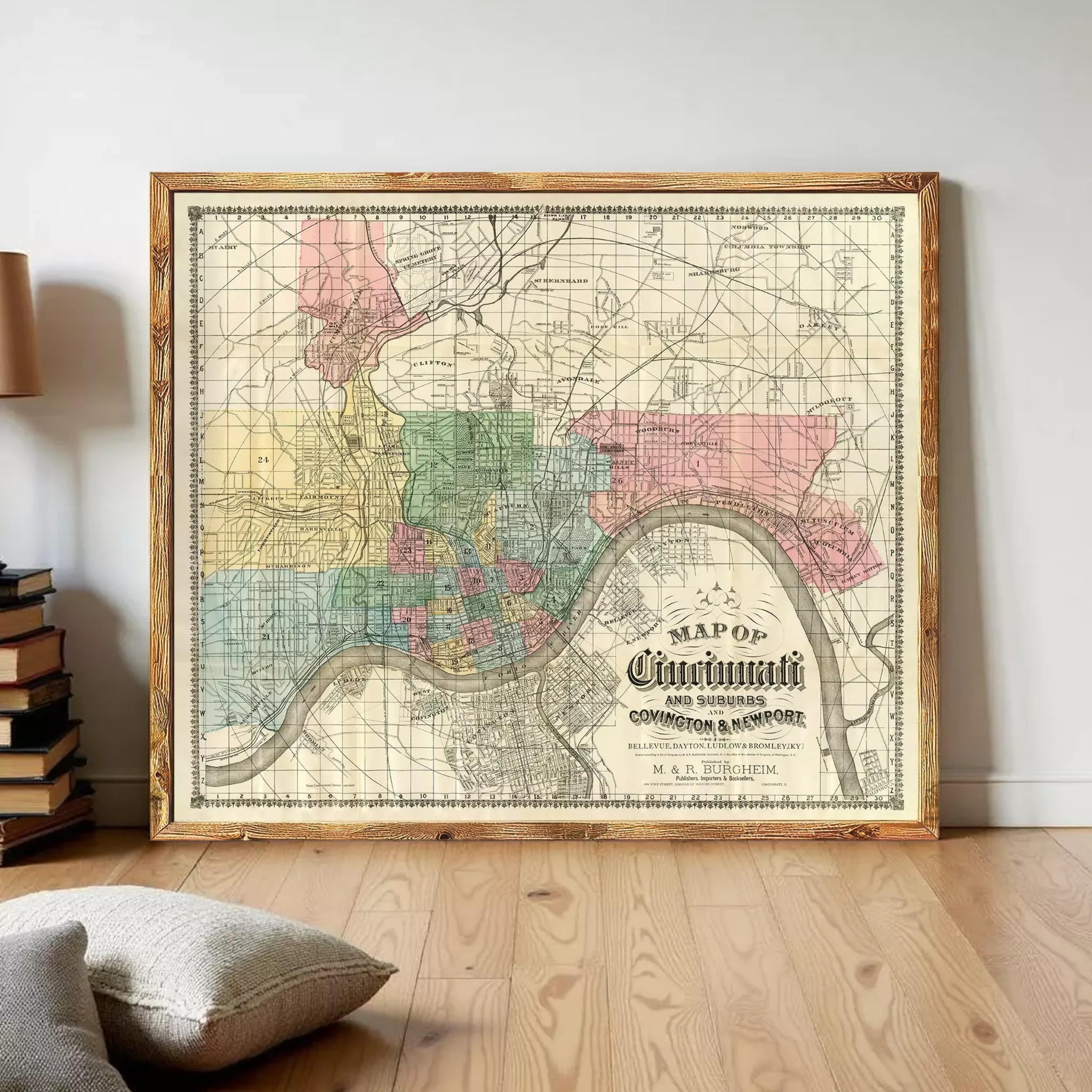 The image is a framed vintage map of Cincinnati, Ohio, showing the city's streets and neighborhoods.