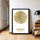 A framed map of Brisbane, Australia, with the city's location and date of 27.29.1953.