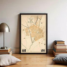 The image is a framed map of a city, depicting streets, buildings, and other urban features.
