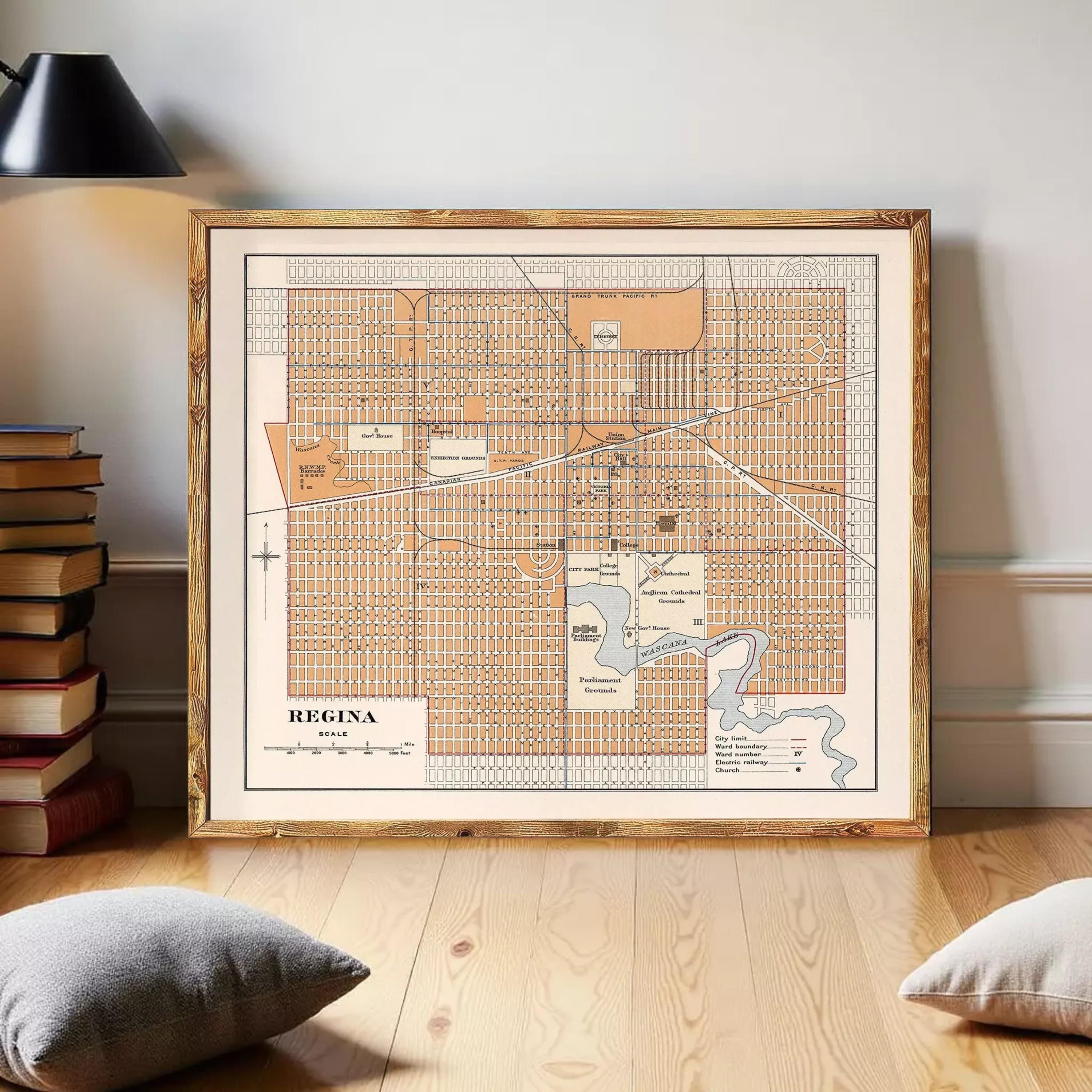 The image is a framed map of Regina, Canada, with a vintage style and a wooden frame.