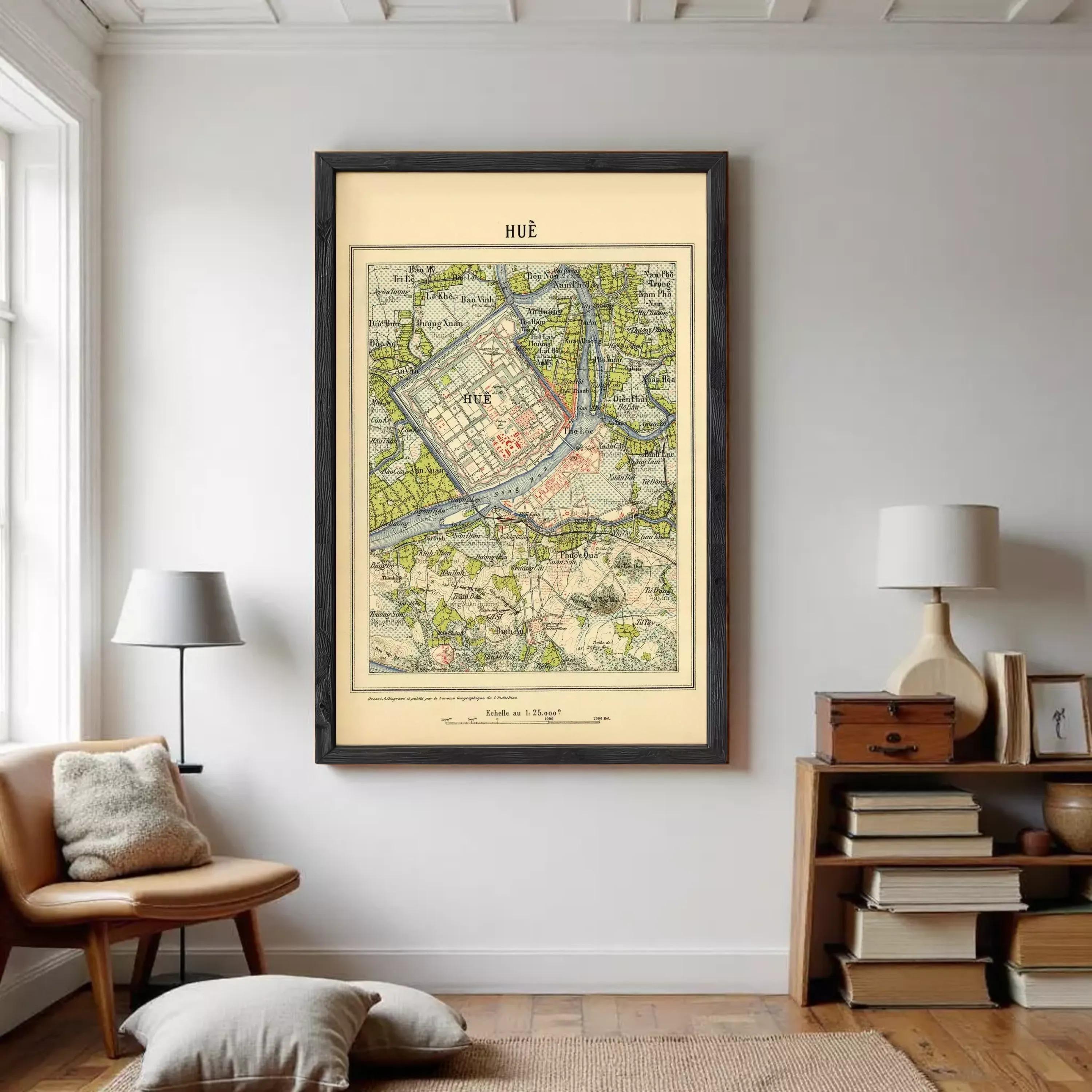 The image is a framed vintage map of Hue, Vietnam, with a black border and a beige background.